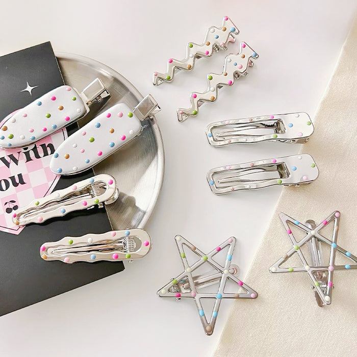 Pinza para el pelo de lunares de colores