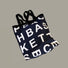 Flat lay of black Alphabet Canvas Tote Bag With Double Strap, ideal for errands and gifting.