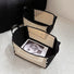 Top view of Bamboo Foldable Storage Basket with magazine inside, easy for storage.