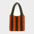 Folded view of Bold Band Knit Bag in orange, easy for commuting and weekends.