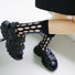 Model wearing a pair of Bold Hollow Socks in dark blue, great for daily wear and lounging.