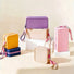 Group shot of colorful pastel silicone waterproof makeup bags stacked on display pedestals.