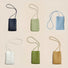 Six woven PU leather cassette crossbody bags in black, sage green, light blue, white, olive green, and tan.