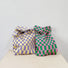 Purple-yellow and pink-green checkered woven bags shown together.