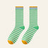 Folded view of Chromatic Stripe Socks in grass green, great for daily wear and lounging.
