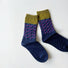 Angled view of Classical Wave Rhythm Socks in navy blue.
