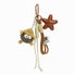 Brown PU leather star and fluffy coalball bag charm with knitted hat, beige and brown ropes.