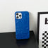 Blue silicone pleated iPhone case. Sleek 3D ripple design with precise camera cutout for minimalist fashion.