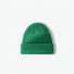Front view of a grass green turned-cuff acrylic knitted beanie.