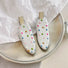 Close-up of Colorful Polka Dot Hair Clip in arrow shape , easy for workdays and special occasions.