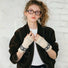 Model wearing cream Fair Isle convertible knit cuffs over dark gloves; cozy winter accessory for outdoors.