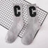 Close-up of Cool C Socks in gray, ideal for workouts and commuting.