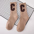 Front view of Cool C Socks in khaki, easy to pack for travel and errands.