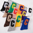 Assortment of 10 Cool C Socks in various colors, each with a contrasting "C" letter.