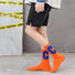 Model wearing a pair of Cool C Socks in orange, great for daily wear and lounging.
