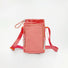 Versatile coral pink water bottle carrier with an adjustable strap, suitable for both adults and kids during family outdoor trips.