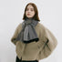 Model wearing a striped scarf in beige and gray, ideal for daily wear and travel.