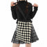 Model carrying a black Diamond Knitted Tote Bag, ideal for city walks and gifting.