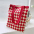 Flat lay of Diamond Knitted Tote Bag in red, great for everyday carry and travel.