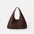 Dark brown version of the minimalist ease suede hobo bag.