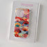 Front view of Fan Flora Case. Delicate fan-like patterns printed on a crystal-clear high-quality acrylic body.