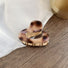 Model wearing a brown acrylic hair claw clip, great for date nights and events.