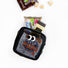 Black Googly Eyes cube mesh pouch packed with snacks; compact zip bag for travel or commuting.