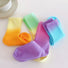 Front view of Four pairs of gradient rainbow socks in yellow-orange, green-yellow, pink-purple.