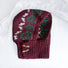 Front view of Jacquard Knitted Balaclava in burgundy, knitted from fine wool with striking patterns for winter style.