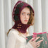 Jacquard knitted wool blend balaclava in burgundy with green patterns and wooden buttons for vintage winter warmth.