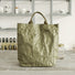 Front view of a green Kraft-like edgy tote bag with a unique crinkled paper texture, showcasing a minimalist industrial design.