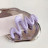 Angled view of Macaron Wave Hair Claw in purple, great for everyday styling and gifting.