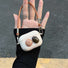 Model hand holding a Maillard Color Stone AirPods Case Cover, great for daily use and protection.