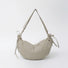 Front view of the khaki mini duvet crescent bag showing the adjustable drawstring and ruched texture.