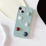 Mint Jewel leather case featuring colorful textured circular and square jewels. Jewel-inspired shimmer.