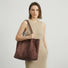 Chic Brown Vegan Suede Tote carried by model - Effortless minimalist style for work or travel.