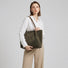 Modern Muse Suede Tote in Olive Green - Model shot showing minimalist style - Premium laptop bag for women.