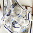 Flat lay of a White satin square scarf with blue nautical chart design, ships, and anchors in navy.