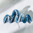 Front view of Painted Wave Hair Claw in blue, easy for workdays and special occasions.