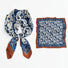 Set of blue and white silk-blend scarves with intricate paisley motifs.