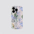 Front view of a pastel jungle phone case featuring abstract tropical leaves and geometric patterns.