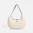Flat lay of Pleated Crescent Shoulder Bag in beige, ideal for errands and gifting.