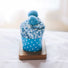 Folded view of Pompom Cupcake Socks in blue, ideal for workouts and commuting.
