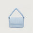 Front view of Light blue puffy quilted nylon bag with an adjustable knotted strap and magnetic flap closure.