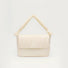 Front view of Puffy Knot Quilted Bag in cream white, great for everyday carry and travel.