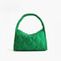 Front view of the forest green argyle quilted hobo bag with a cloud-like texture.