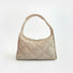 Front view of the khaki argyle quilted hobo bag with a cloud-like texture.