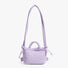Lilac purple padded nylon bag with extended straps, showing the adjustable knotting system for custom lengths.