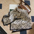 Flat lay of Rose Silk Scarf, great for office layering and commuting.