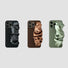 Three silicone iPhone cases with black, brown, and olive green satin scrunchie wristbands.